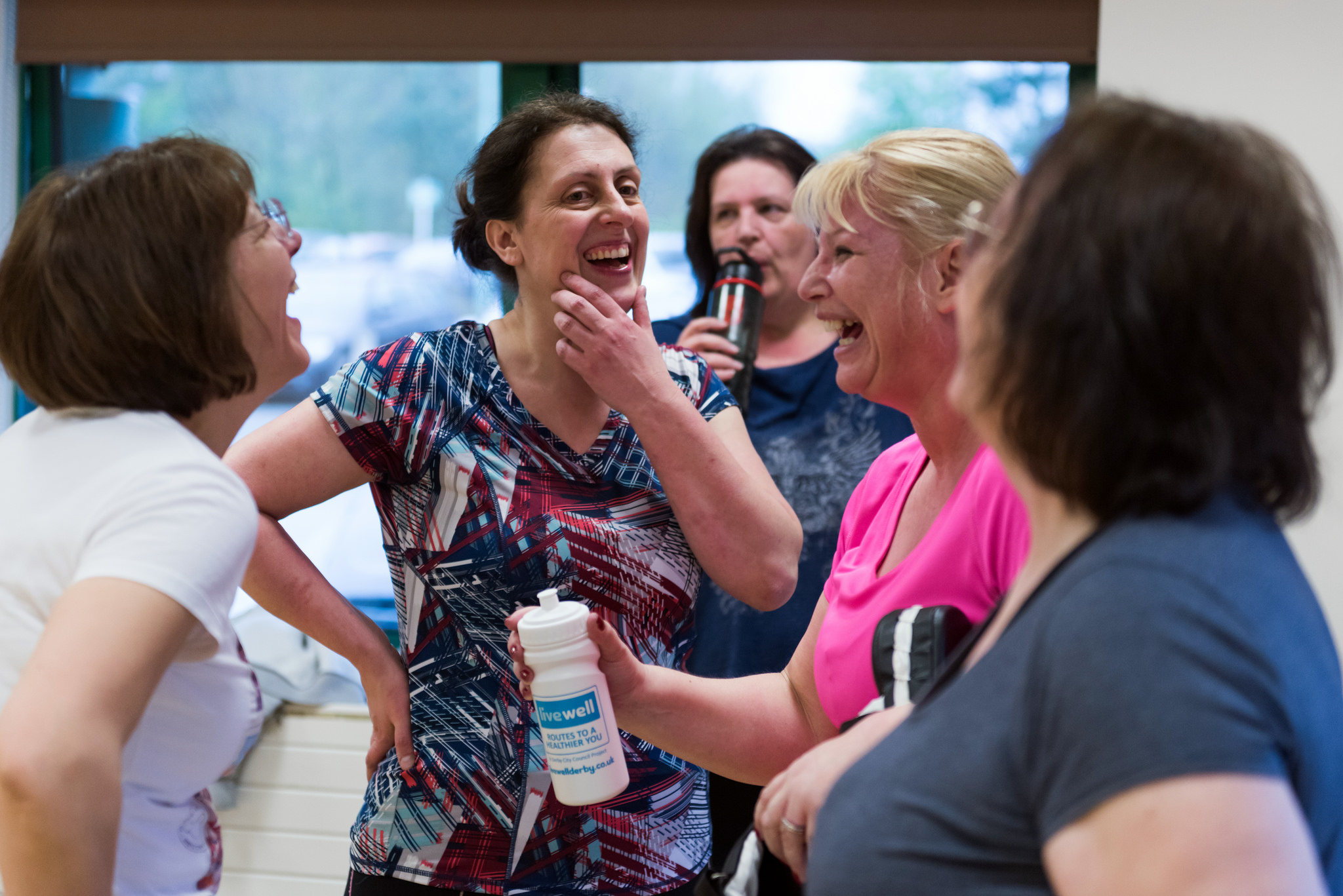 Image of Livewell clients laughing at an exercise class